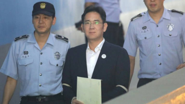Lee Jae-Yong, the de-facto head of Samsung Electronics, was found guilty last week of bribery, perjury and other charges related to payments made by Samsung made to ousted president Park Gueun-Hye’s secret confidante Choi Soon-Sil — AFP
