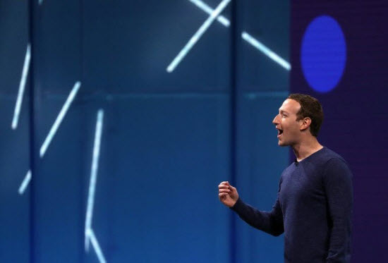 Facebook CEO Mark Zuckerberg says an independent body will make some of the tough calls on what kinds of content is inappropriate or abusive on the social network. — AFP