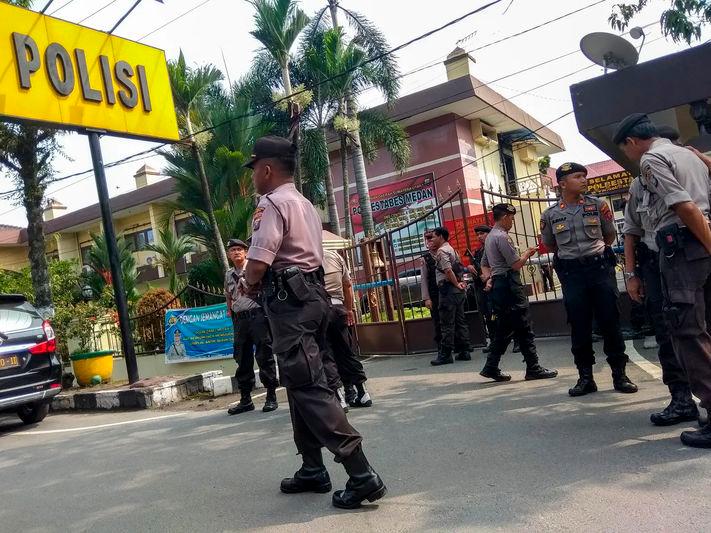 The West Sumatra police said they have questioned 39 officers so far and have not received reports of abuse - AFPpix