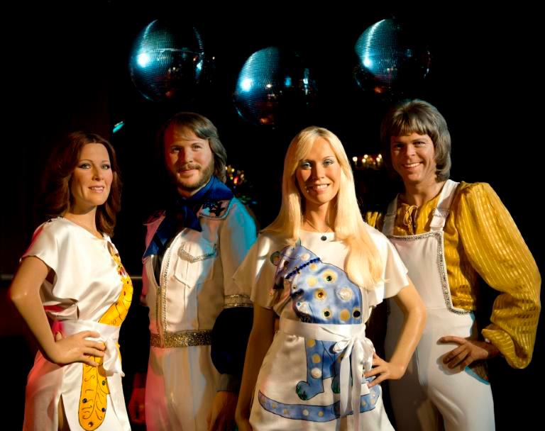 Two singles released by the legendary group for the first time in 40 years have landed on the UK top 10 chart. — AFP