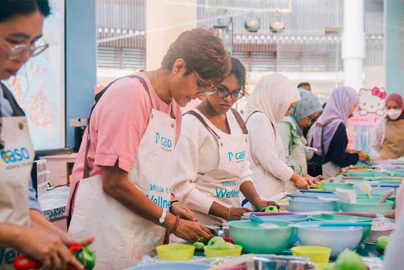 $!Participants at Hospital Picaso's fundraiser baking workshop, held in collaboration with the BCWA.