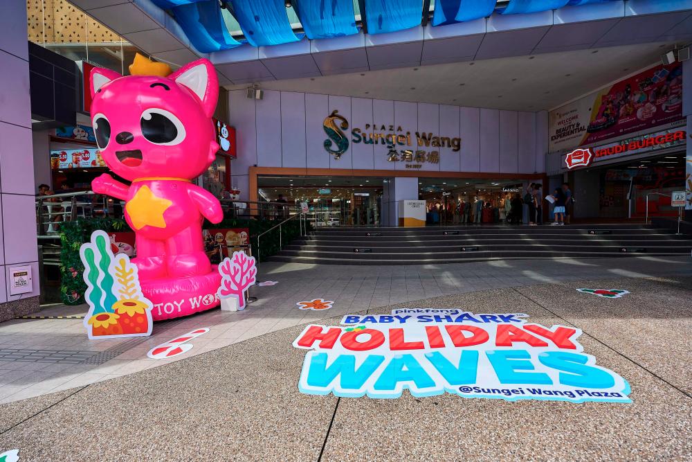 $!Shoppers will be greeted with a Pinkfong inflatable figurine at entrance.