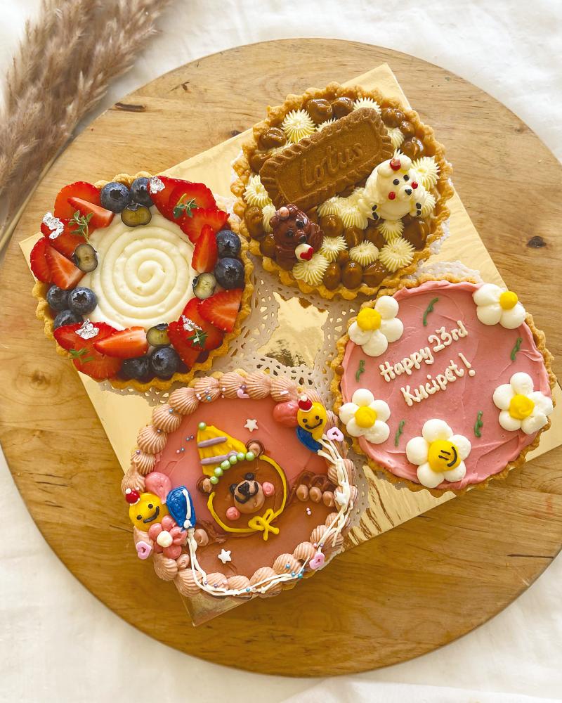 $!For those who like something fruity and cute, Khalissah has designed a selection of adorable mixed fruit tarts.