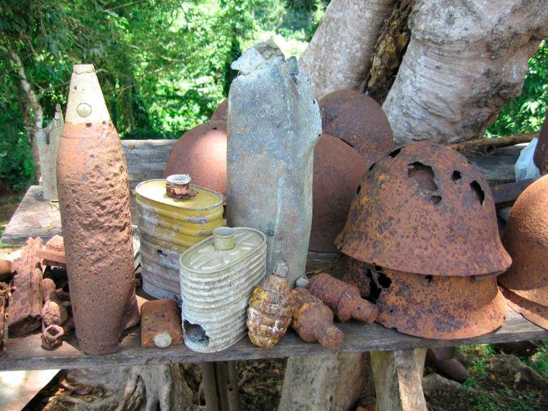 WWII munitions and equipment, like these shown in a village near Honiara in 2005, are regularly found in the Solomon Islands, which were the site of fierce fighting between Allied and Japanese forces. — AFP