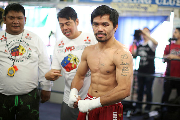 Boxer Manny Pacquiao of the Philippines works out in advance of his WBO welterweight bout against Jessie Vargas, in Los Angeles, US, Oct 26, 2016. — Reuters
