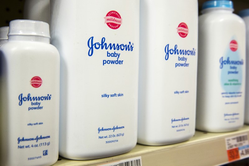 Bottles of Johnson &amp;amp; Johnson baby powder line a drugstore shelf in New York October 15, 2015. — Reuters