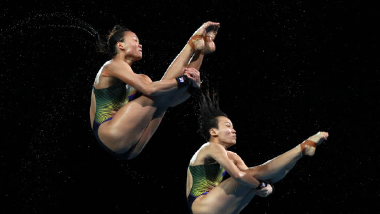 Divers Jun Hoong Cheong and Pandelela Rinong Pamg in the Women’s Synchronized 10m Platform Final of the Gold Coast 2018 Commonwealth Games at the Optus Aquatic Centre, Gold Coast, Australia on April 11, 2018. — Reuters
