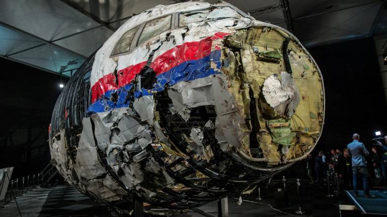 The reconstructed wreckage of Malaysia Airlines flight MH17 which crashed over Ukraine in July 2014 is seen in Gilze Rijen, Netherlands on Oct 13, 2015. — Reuters