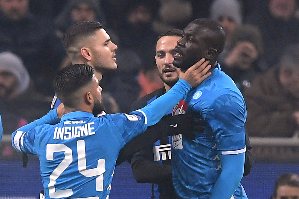 Inter Milan’s Mauro Icardi clashes with Napoli’s Kalidou Koulibaly and Lorenzo Insigne during their Serie A match at the San Siro in Milan on Dec 26, 2018. — Reuters