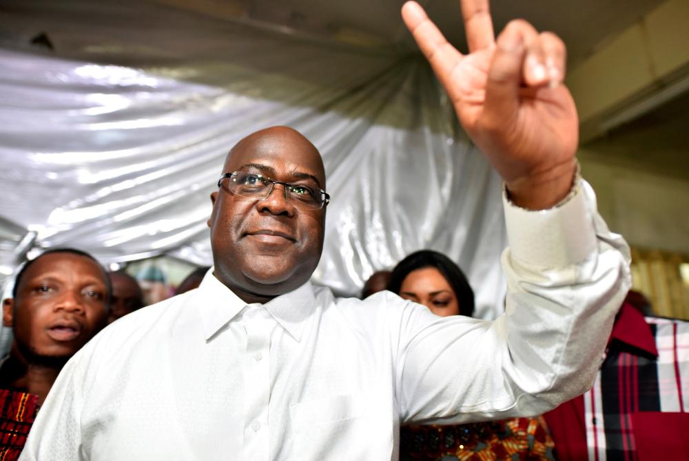 Felix Tshisekedi, leader of the Congolese main opposition party, the Union for Democracy and Social Progress who was announced as the winner of the presidential elections gestures to his supporters at the party headquarters in Kinshasa, Democratic Republic of Congo, Jan 10, 2019. — Reuters