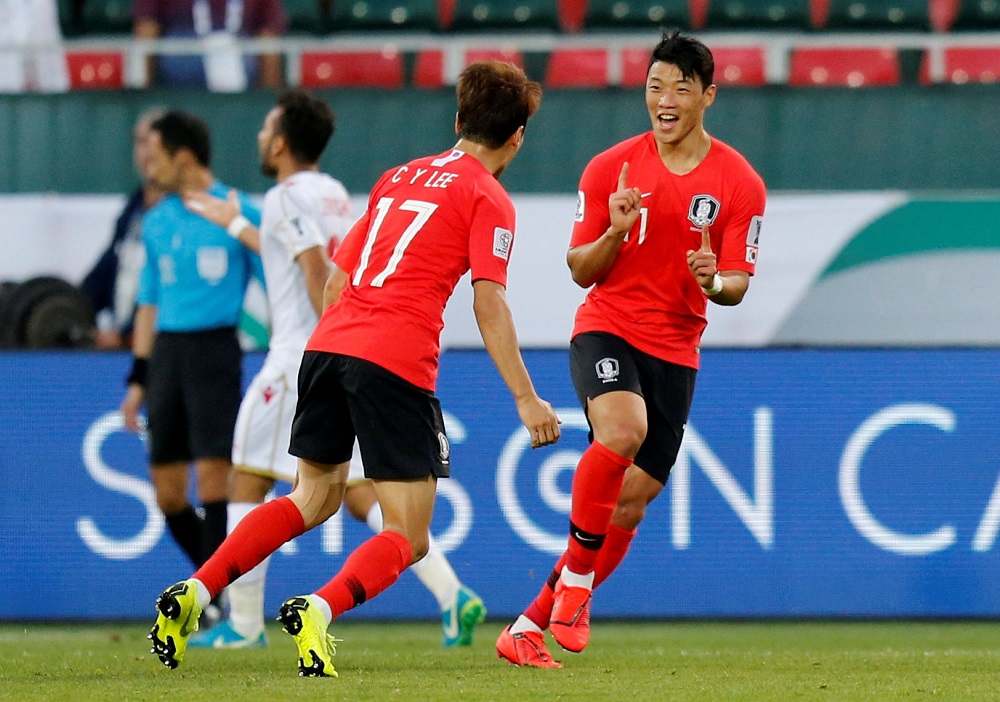 South Korea’s Hwang Hee-chan celebrates scoring their first goal with Lee Chung-yong at the Maktoum bin Rashid Al Maktoum Stadium in Dubai, on Jan 22, 2019. — Reuters
