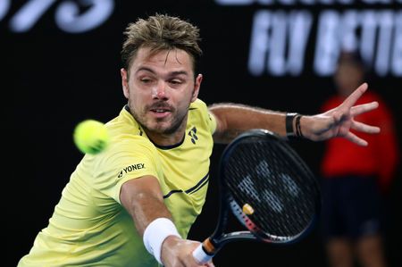 Switzerland’s Stanislas Wawrinka celebrates after victory over France’s Benoit Paire in their first round men’s singles match at the ABN AMRO World Tennis Tournament in Rotterdam, on February 11, 2019. — AFP