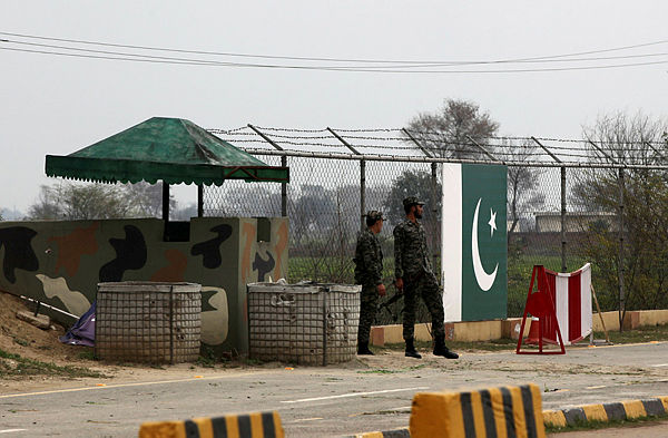 Paramilitary soldiers stand guard at a check post, before the release of Indian pilot Wing Commander Abhi Nandan, at Wagah border post near Lahore, Pakistan March 1, 2019. — Reuters
