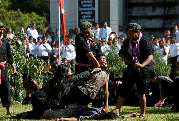 Actors reenact a scene based on the Khmer Rouge regime during the annual ‘Day of Anger’ where people gathered to remember those who perished during the communist Khmer Rouge regime, outskirts of Phnom Penh, Cambodia, May 20, 2019. - Reuters