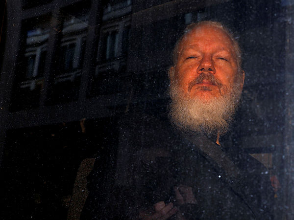 WikiLeaks founder Julian Assange is seen as he leaves a police station in London, Britain April 11, 2019. - Reuters