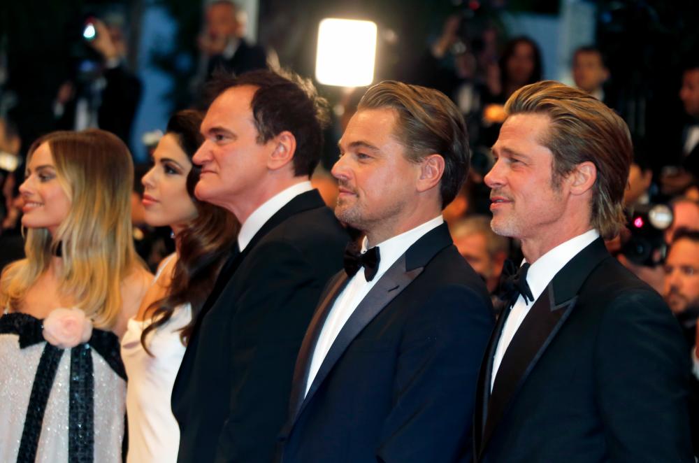 72nd Cannes Film Festival - After the screening of the film “Once Upon a Time in Hollywood” in competition - Red Carpet - Cannes, France, May 21, 2019. Director Quentin Tarantino, his wife Daniella Pick, cast members Brad Pitt, Leonardo DiCaprio and Margot Robbie pose. REUTERS/Regis Duvignau