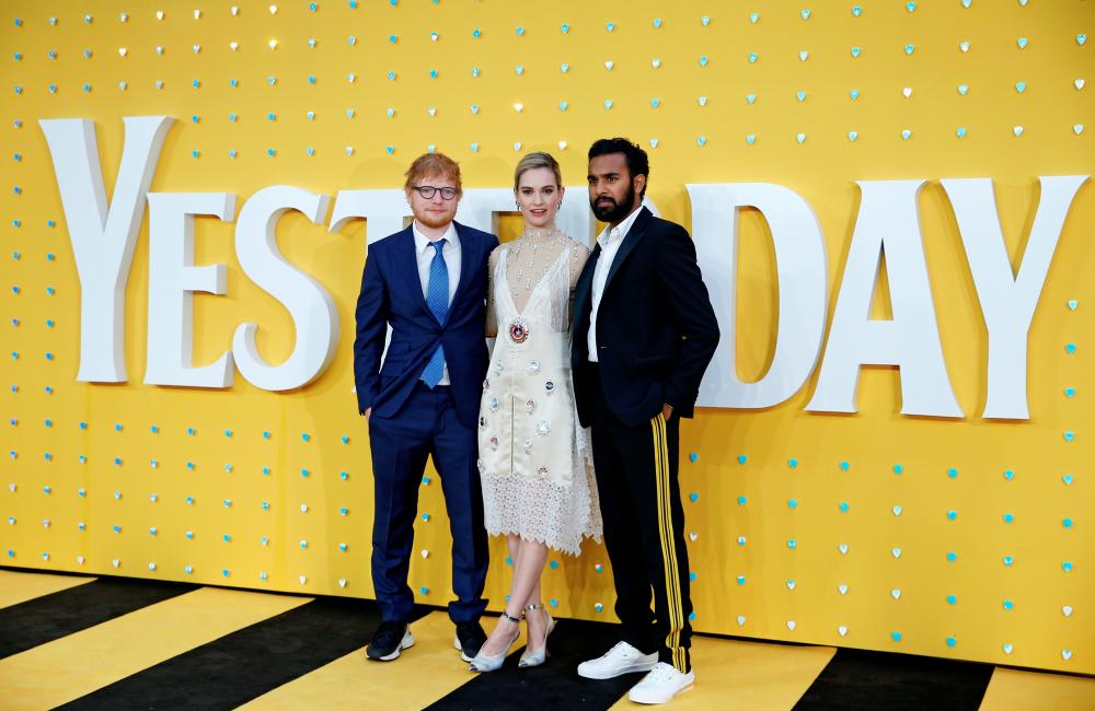 Cast members Ed Sheeran, Lily James and Himesh Patel attend the UK premiere of “Yesterday” in London, Britain, June 18, 2019. REUTERS/Henry Nicholls