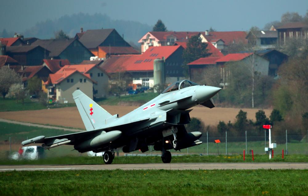A Eurofighter Typhoon jet lands after tests organised by Armasuisse to replace the fighter jets of the Swiss Air Force in Payerne, Switzerland April 12, 2019. — Reuters