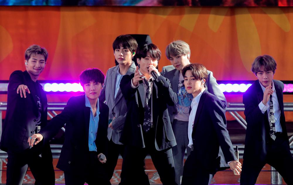 FILE PHOTO: Members of K-Pop band, BTS perform on ABC’s ‘Good Morning America’ show in Central Park in New York City, U.S., May 15, 2019. REUTERS/Brendan McDermid/File Photo