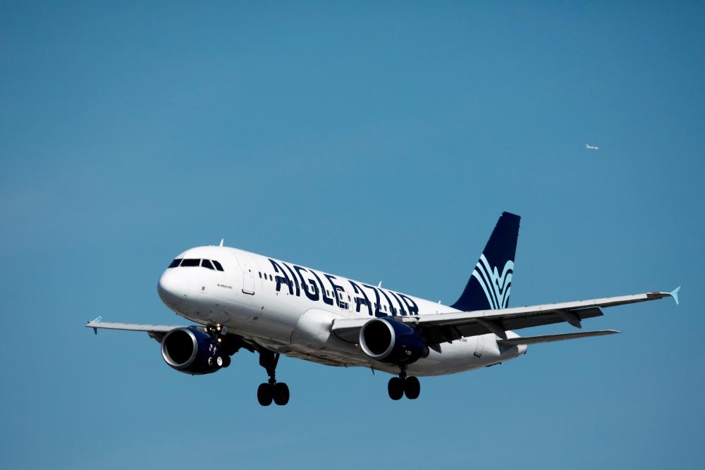 An Airbus A320-200 aircraft, operated by Aigle Azur, lands at Orly Airport near Paris, France, September 6, 2019. — AFP