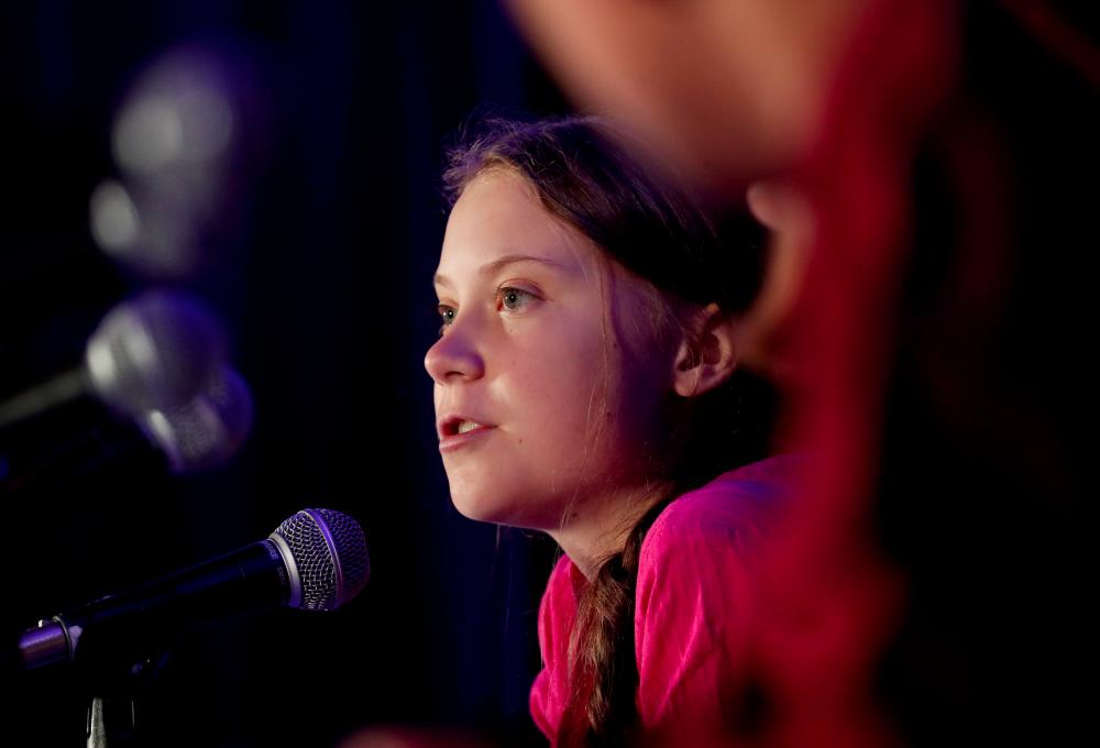 Swedish climate activist Greta Thunberg speaks with other child petitioners from 12 countries who presented a landmark complaint to the United Nations Committee on the Rights of the Child to protest the lack of government action on the climate crisis during a news conference in New York, US, Sept 23, 2019. — Reuters