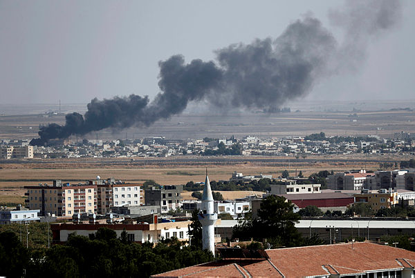 Smoke billows out after Turkish shelling on the Syrian town of Ras al Ain, as seen from the Turkish border town of Ceylanpinar, in Sanliurfa province, Turkey, October 13, 2019. — Reuters