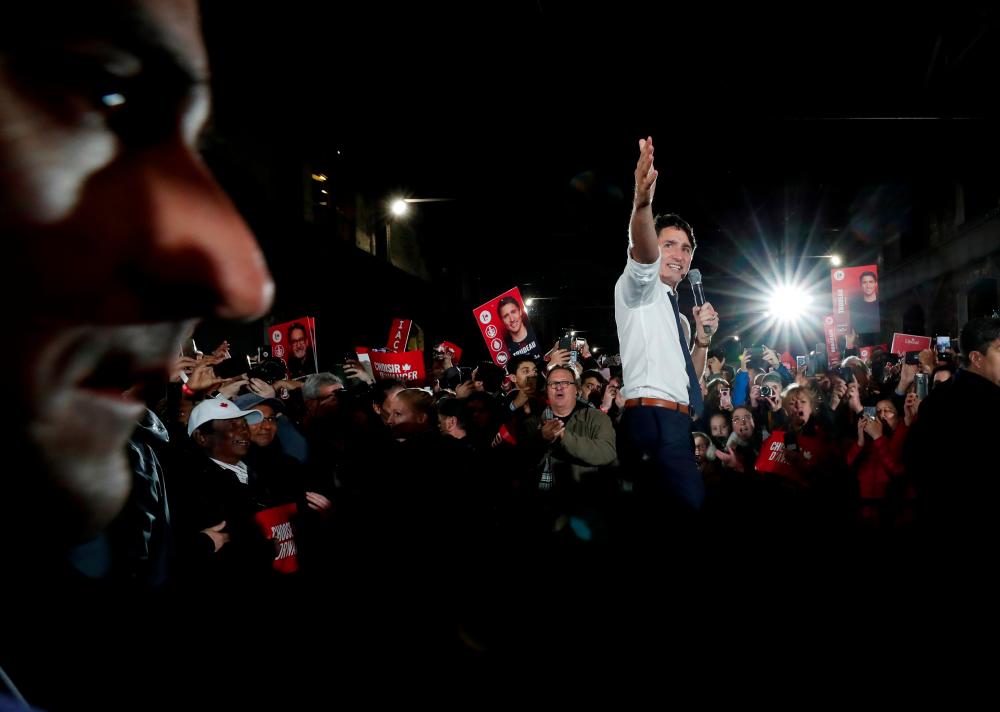 Liberal leader and Canadian Prime Minister Justin Trudeau takes part in a rally as he campaigns for the upcoming election, in Montreal, Quebec, Canada on Oct 17, 2019. — Reuters