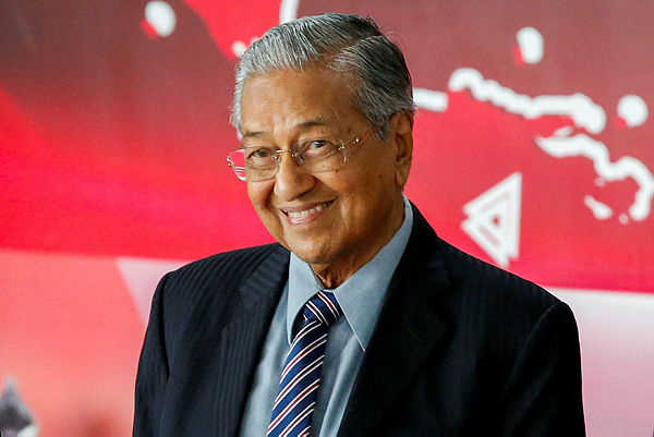 Prime Minister Mahathir Mohamad reacts after attending the inauguration of Indonesia’s President Joko Widodo for the second term, at the House of Representatives building in Jakarta, Indonesia, yesterday. — Reuters