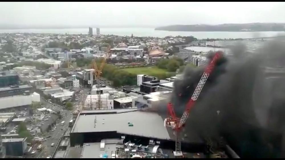 Smoke rises as a fire blazes at Sky City Convention Centre, which is under construction in Auckland, New Zealand, Oct 22, 2019, in this still image taken from video obtained from social media. — Reuters