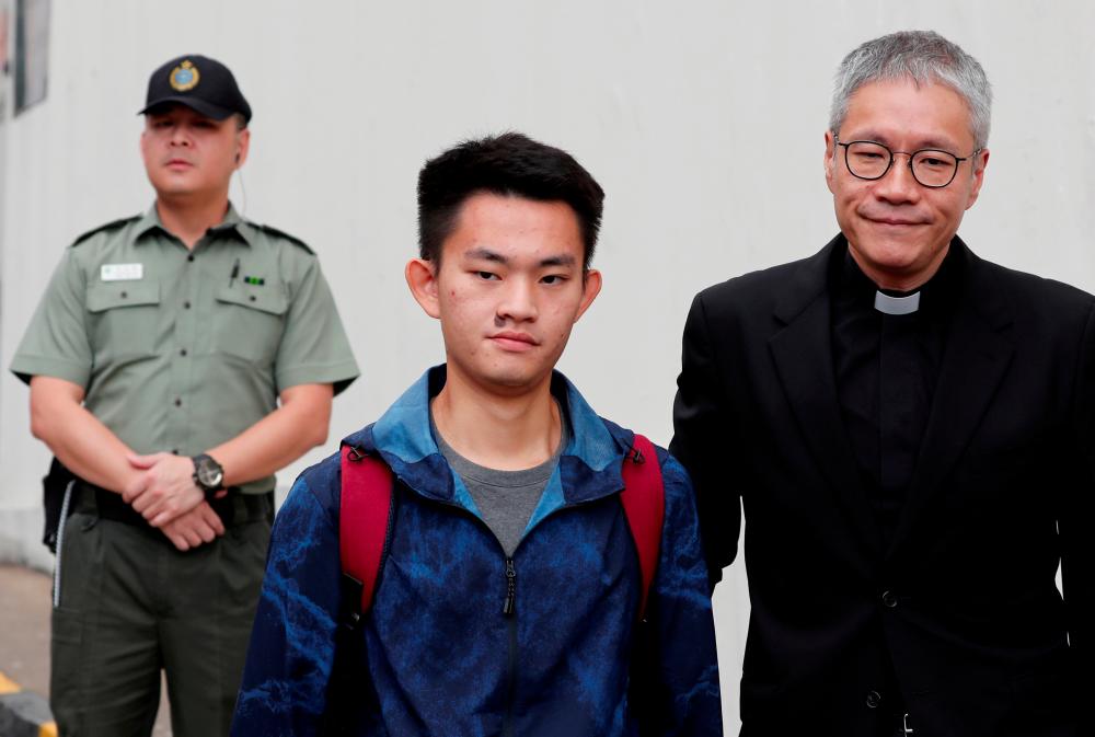 Chan Tong-kai, a Hong Kong citizen who was accused of murdering his girlfriend in Taiwan last year, leaves from Pik Uk Prison, in Hong Kong, China Oct 23, 2019. — Reuters