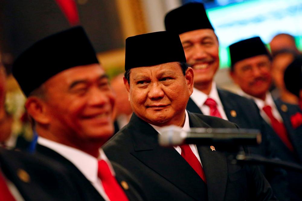 Head of Gerindra Party Prabowo Subianto, who was the former rival of Indonesian President Joko Widodo in April's election, looks on before taking his oath as appointed Defense Minister during the inauguration at the Presidential Palace in Jakarta, Indonesia, Oct 23, 2019. — Reuters