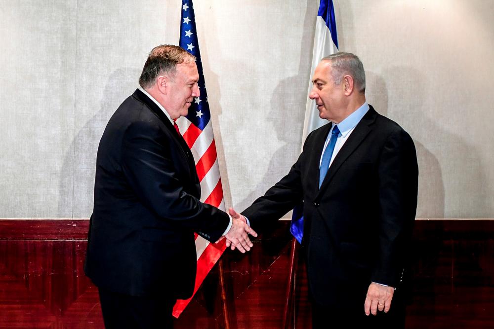 The United States Secretary of State Mike Pompeo meets Israeli Prime Minister Benjamin Netanyahu in Lisbon Portugal, Dec 4, 2019. — Reuters