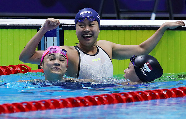 Malaysia’s Phee Jinq En celebrates winning the women’s 50m breaststroke final today in New Clark City — Reuters