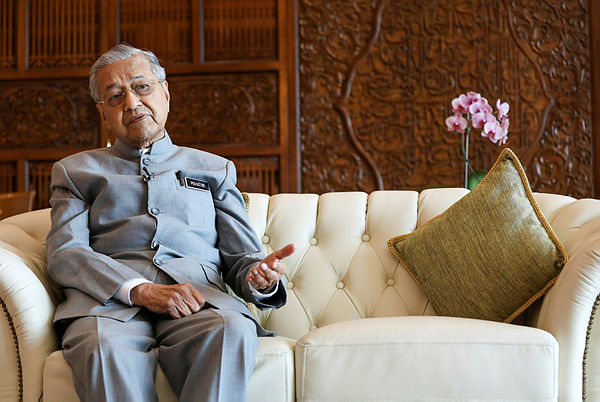 Malaysia’s Prime Minister Mahathir Mohamad speaks during an interview with Reuters in Putrajaya, Malaysia, Dec 10, 2019 — Reuters