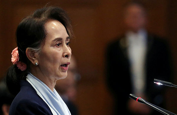 Myanmar’s leader Aung San Suu Kyi speaks on the second day of hearings in a case filed by Gambia against Myanmar alleging genocide against the minority Muslim Rohingya population, at the International Court of Justice (ICJ) in The Hague, Netherlands Dec 11, 2019 — Reuters