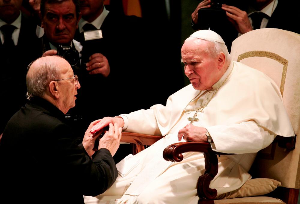 In this file photo taken on Nov 30, 2004, Pope John Paul II (R) blesses Father Marcial Maciel, founder of the Legionaries of Christ, during a special audience in Paul VI hall at the Vatican. — Reuters