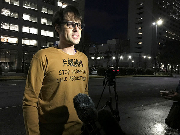 Scott McIntyre, an Australian sports journalist, speaks outside the Tokyo District Court after spending a month and a half in jail on charges of trespassing to find his missing children, in Tokyo, Japan Jan 15. — Reuters