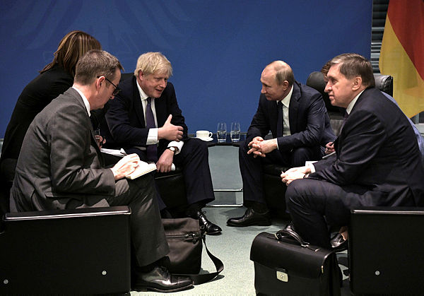 Russia’s President Vladimir Putin and Britain’s Prime Minister Boris Johnson meet on sideline of the Libya summit in Berlin, Germany Jan 19, 2020