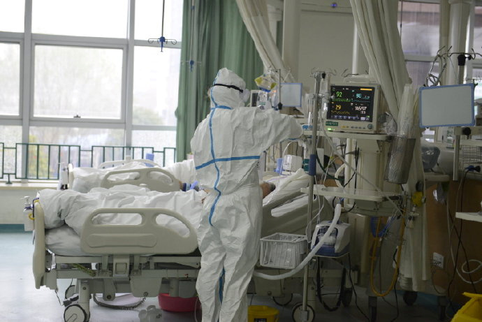 A picture released by the Central Hospital of Wuhan shows medical staff attending to patient at the The Central Hospital Of Wuhan Via Weibo in Wuhan, China on an unknown date. — Reuters