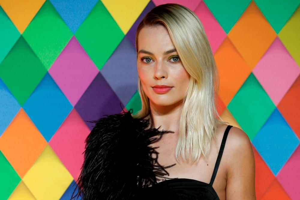 Cast member Margot Robbie poses as she arrives to attend the world premiere of “Birds of Prey: And the Fantabulous Emancipation of One Harley Quinn”, in London, Britain January 29, 2020. REUTERS/Henry Nicholls