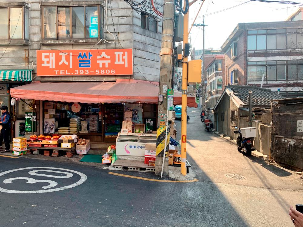 Pig Rice Supermarket featured in South Korea’s Oscar-winning Parasite is seen in Ahyeon-dong, one of the last shanty towns near downtown Seoul, South Korea February 11, 2019. Picture taken February 11, 2020. REUTERS/Hyun Young Yi