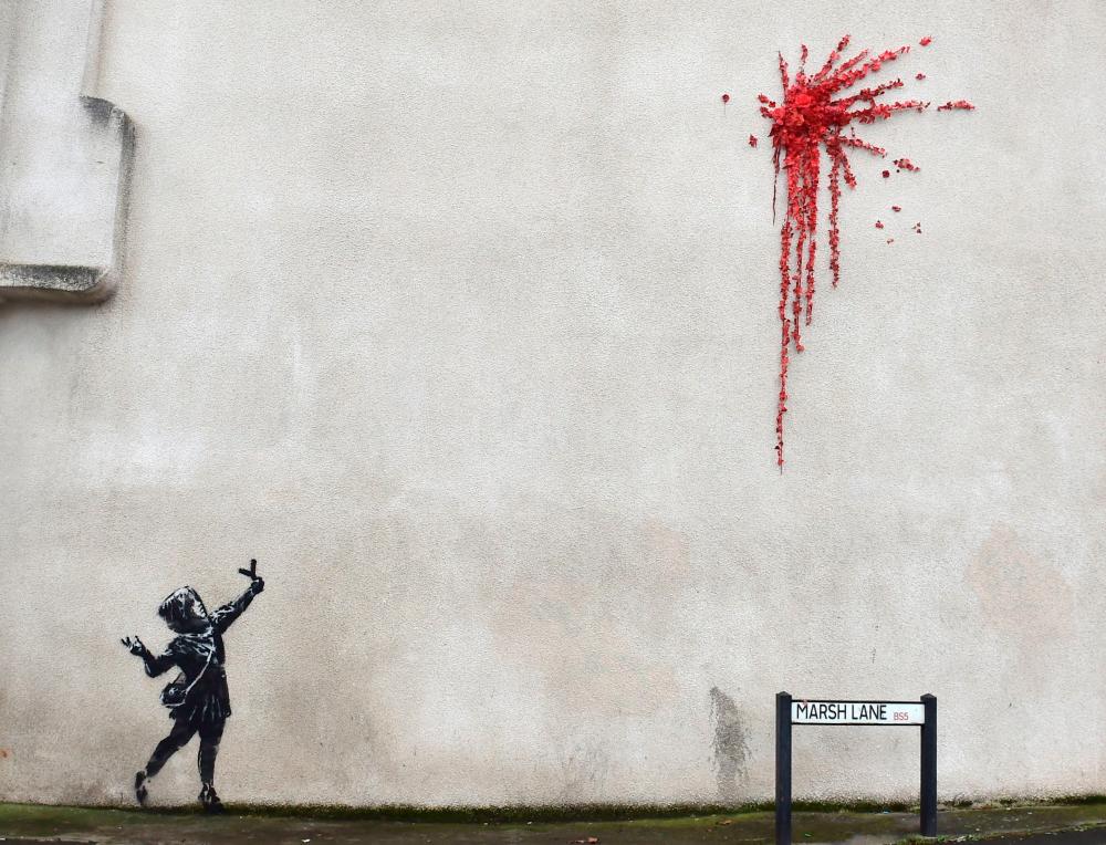 A suspected new mural by artist Banksy is pictured in Marsh Lane in Bristol, Britain, February 13, 2020. REUTERS/Rebecca Naden