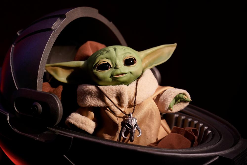 An animatronic Baby Yoda toy is pictured during a “Star Wars” advance product showcase in the Manhattan borough of New York City, New York, U.S., February 20, 2020. REUTERS/Carlo Allegri