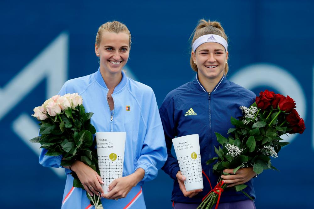 Czech Republic's Petra Kvitova (left) and Karolina Muchova with their trophies. – REUTERSPIX