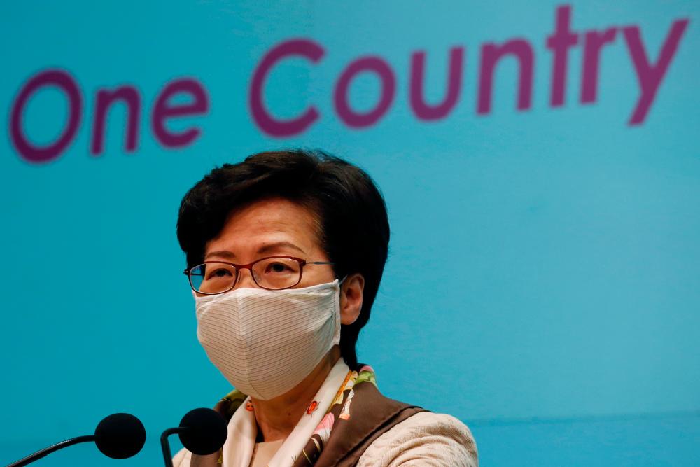 Hong Kong Chief Executive Carrie Lam, wearing a mask due to the ongoing global outbreak of the coronavirus (Covid-19), speaks during a news conference over the new national security legislation in Hong Kong, China, June 2, 2020. — Reuters