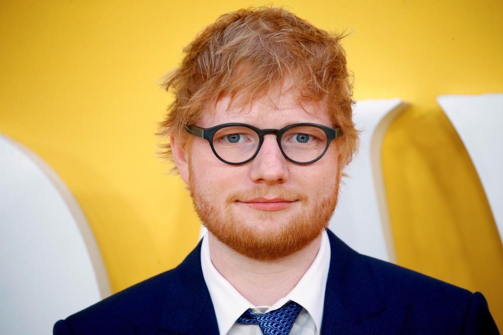 FILE PHOTO: Cast member Ed Sheeran attends the UK premiere of “Yesterday” in London, Britain, June 18, 2019. REUTERS/Henry Nicholls/File Photo