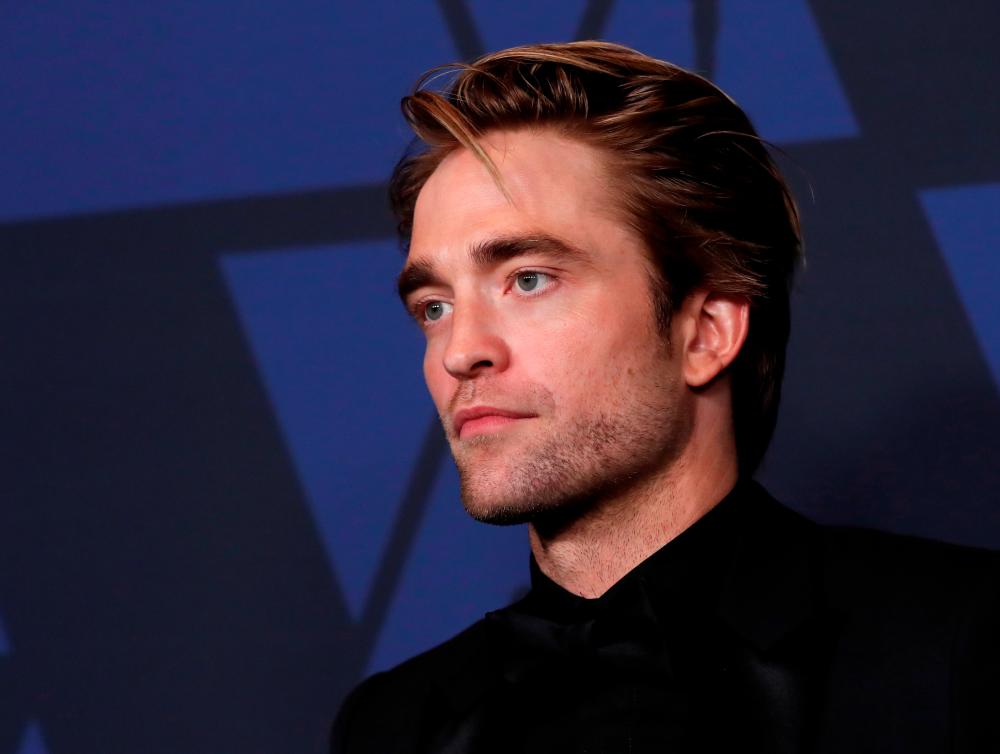 FILE PHOTO: 2019 Governors Awards - Arrivals - Los Angeles, California, U.S., October 27, 2019 - Robert Pattinson. REUTERS/Mario Anzuoni/File Photo