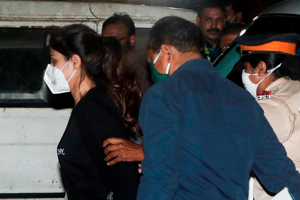 $!Bollywood actress Rhea Chakraborty arrives at the Narcotics Control Bureau (NCB) after she was arrested in Mumbai, India, September 8, 2020. REUTERS/Francis Mascarenhas