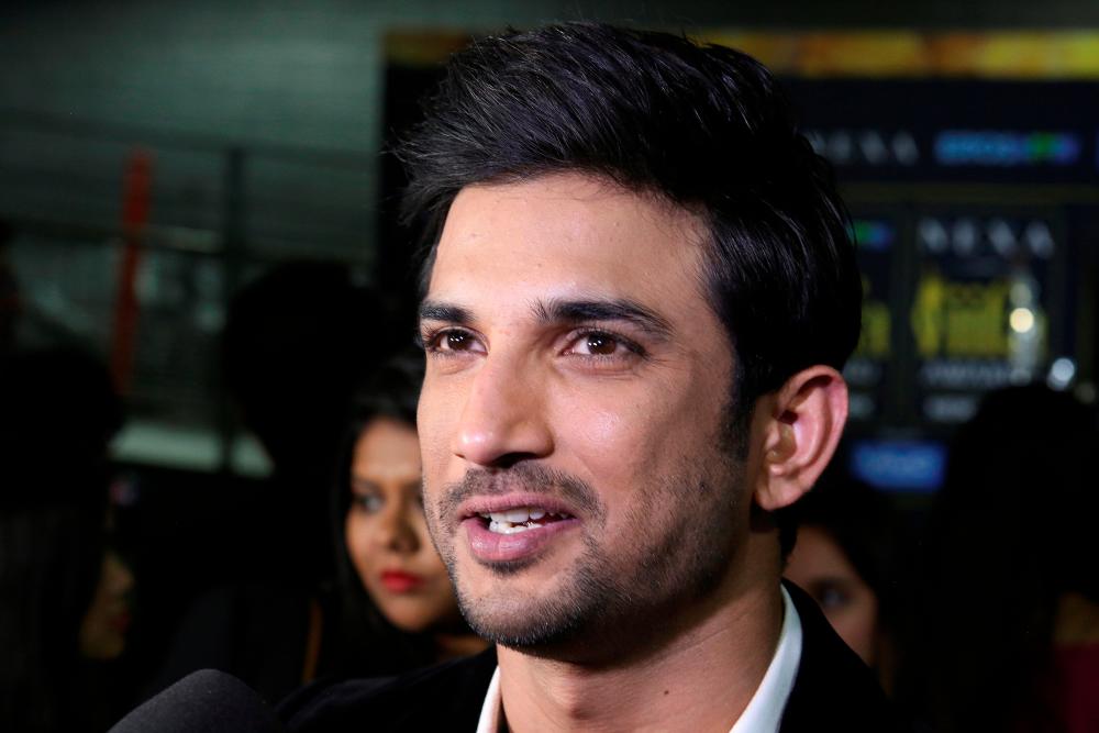 FILE PHOTO: Actor Sushant Singh talks to the media on the green carpet at the International Indian Film Academy Rocks show at MetLife Stadium in East Rutherford, New Jersey, U.S., July 14, 2017. REUTERS/Joe Penney/File Photo