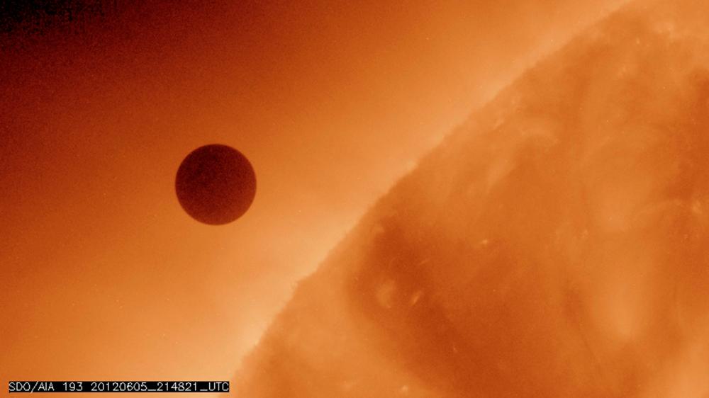 ILE PHOTO: Handout image courtesy of NASA shows the planet Venus at the start of its transit of the Sun, June 5, 2012. REUTERS/NASA/AIA/Solar Dynamics Observatory/Handout